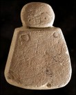 Neolithic carving raises eyebrows